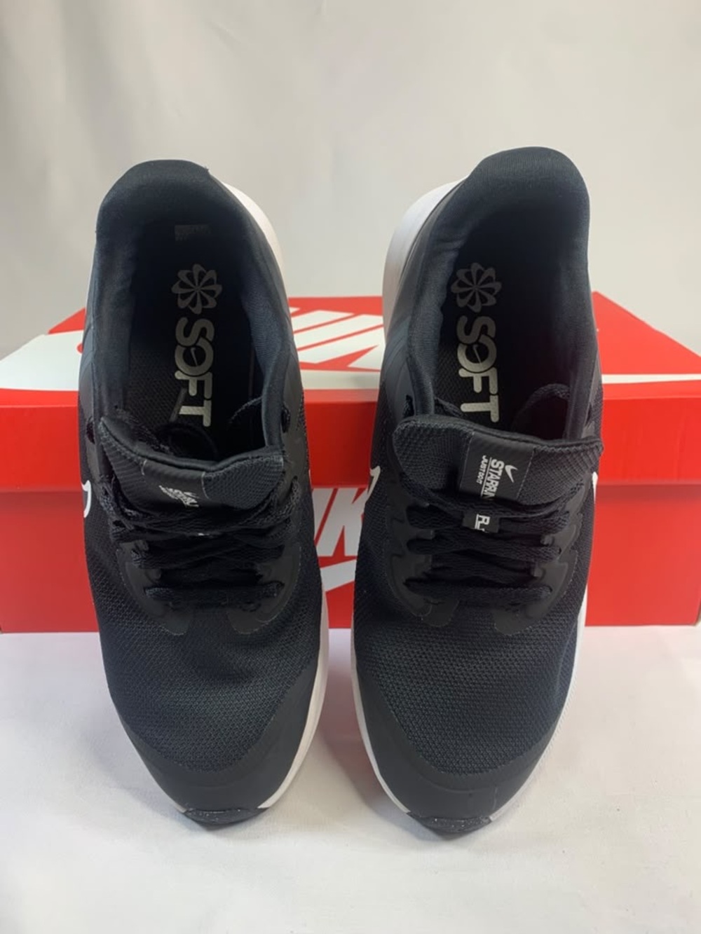Nike Black Athletic Running Shoes with White Sole